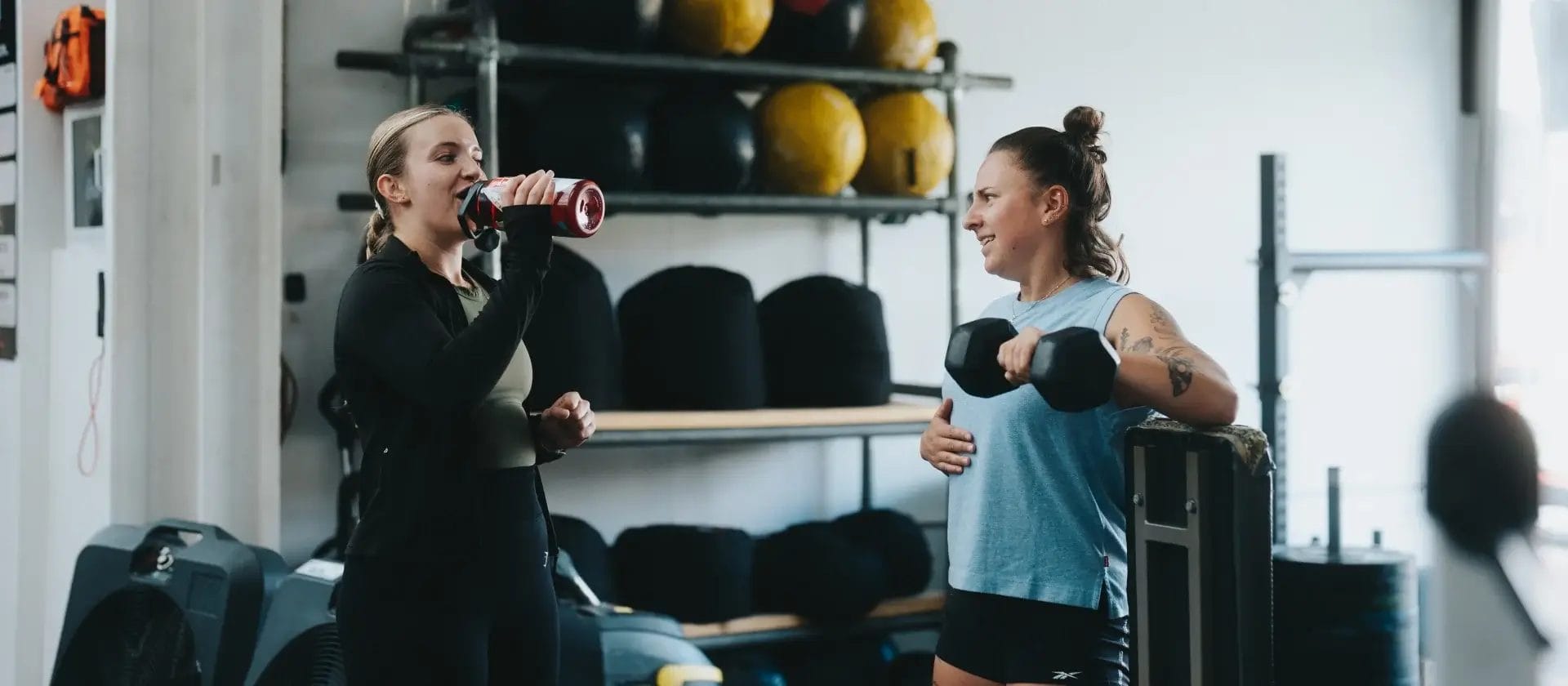 Women workout with dumbells